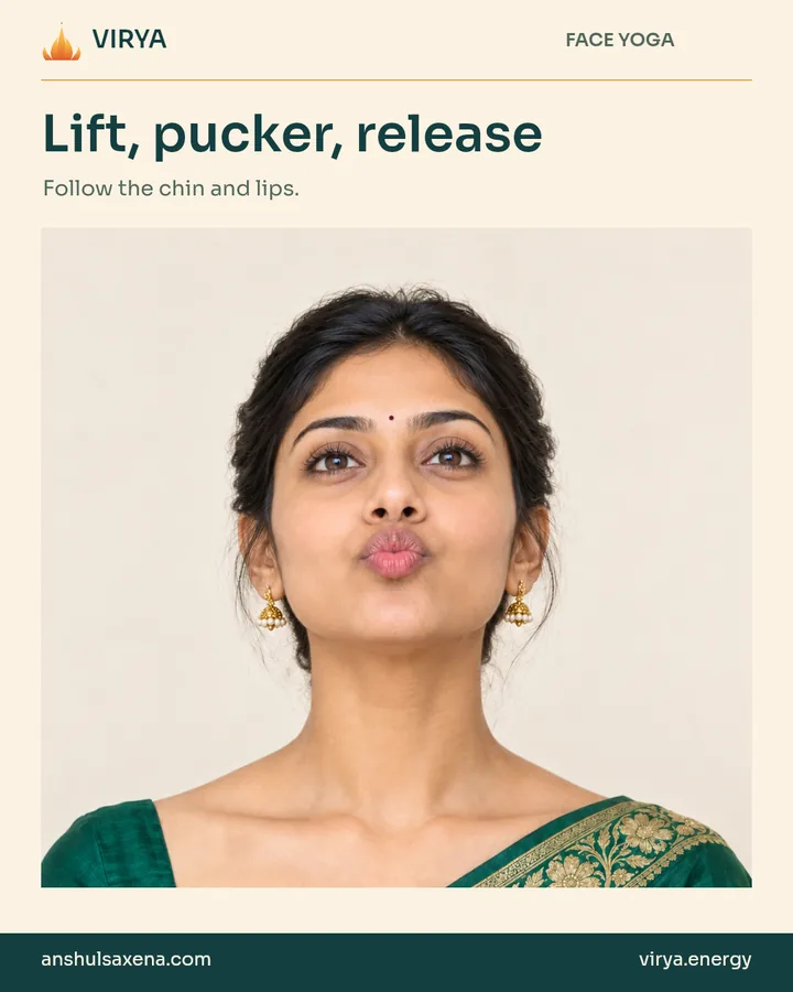 Fictional young adult Indian woman in an embroidered emerald silk saree demonstrates Lift, pucker, release.
